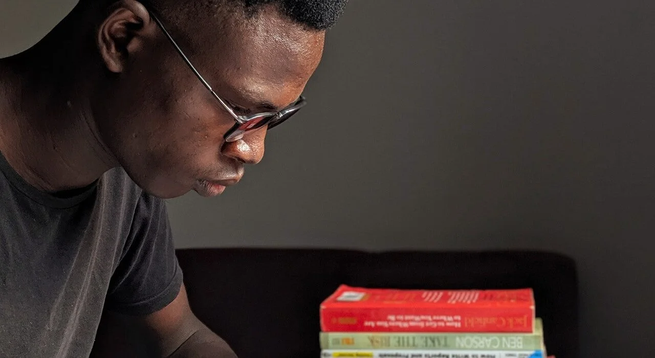 man reading a book 2861798